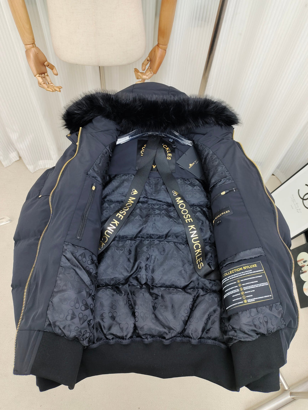 Moose Knuckles Navy Blue Hooded Puffer Bomber Jacket with Fur-Style Trim