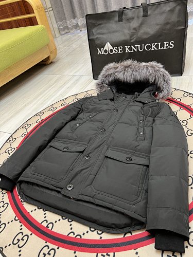 Moose Knuckles Men's Black Quilted Parka with Gray Fur-Style Hood Trim