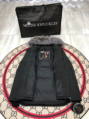 Moose Knuckles Men's Black Quilted Parka with Gray Fur-Style Hood Trim